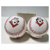 Three Tony the tiger baseballs