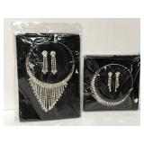 Two shimmering costume jewelry sets