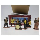 Twelve small musician figurines