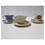 Three assorted teacup and saucer sets