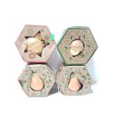 Four handcast paper art ornaments