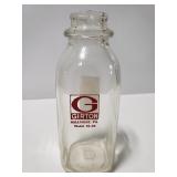 Glass Girton milk bottle