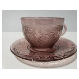 Purple glass teacup and saucer