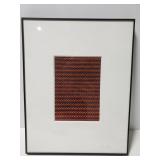 Framed woven rug piece