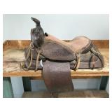 Vintage tooled leather Western saddle