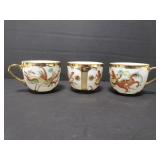 Three Painted dragon porcelain teacups