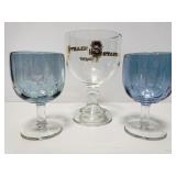 Three large glass goblets