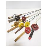 Eight vintage ice fishing rods