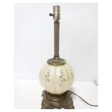 Vintage glass lamp w/ ornate bottom