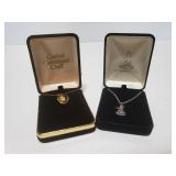 Two hummel collectors necklaces