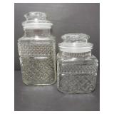 Two glass kitchen canisters