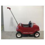 Radio Flyer ride-on toy car with push handle