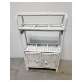 White wicker wall shelf