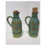 Two ceramic crate and barrel corked decanters