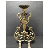 Ornate brushed metal candlestick holder