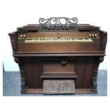 Antique pump organ w/ ornate detail