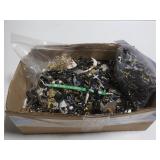 Box of unused charms for jewelry making