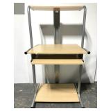 Space saving rolling desk station