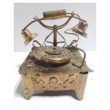 Metal welded rotary phone music box