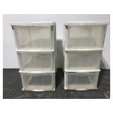 Two plastic three drawer storage