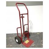 Red metal wheeled dolly cart