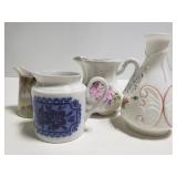 Porcelain pitchers and vase