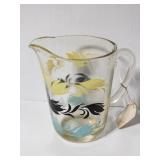 Vintage small glass pitcher
