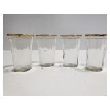 Four small gold rim cups