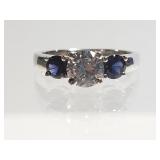 Marked 925 Sterling silver ring with blue gems