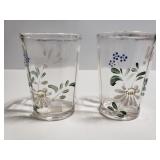 Two floral painted drinking glasses