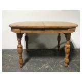 Vintage oak wood dining table w/ hidden leaves