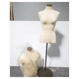 Female and male mannequin busts with stand