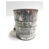 Vintage metal flour sifter