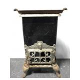 Antique Eriez cast iron parlor gas stove