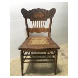 Antique oak carved back cane seat chair