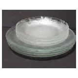 Eleven clear glass plates
