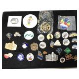 Assorted pin, pendant & keychains