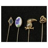 Four stick lapel pins
