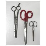 Three pairs of vintage scissors