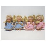 Four small angel dolls