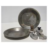 Two pie pan liners and metal cookie cutters