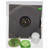 Vinyl record and glass pieces