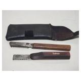 Two vintage metal barber combs