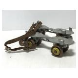 Vintage adjustable roller skates w/ key