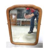 Old wood framed hanging mirror
