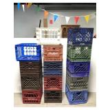 Lot of 14 plastic milk crates