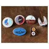 Assorted airline lapel pins