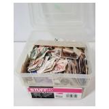 Small bin full of stamps