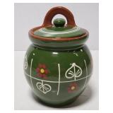 Green and brown pottery canister with lid