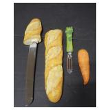 Bread shaped knife and carrot shaped peeler